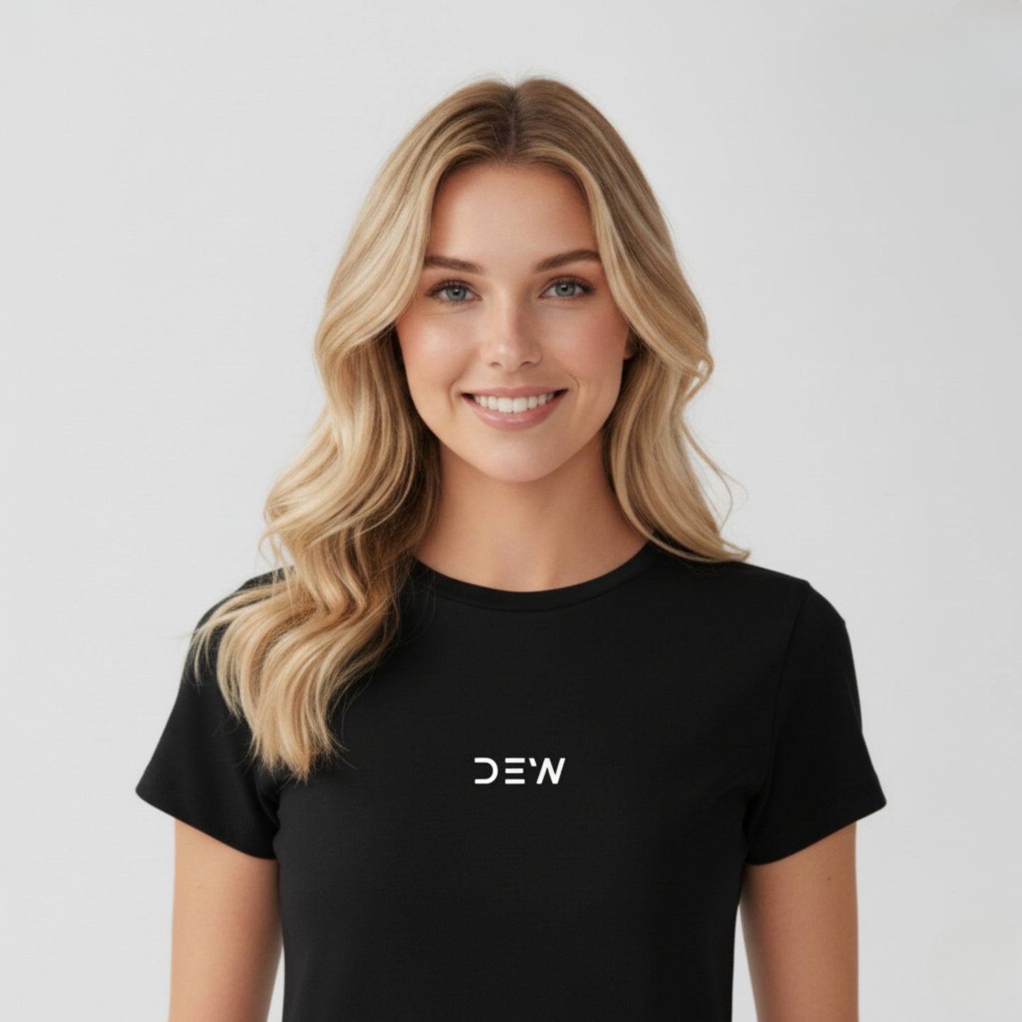 Woman wearing Dew black tee in a white background
