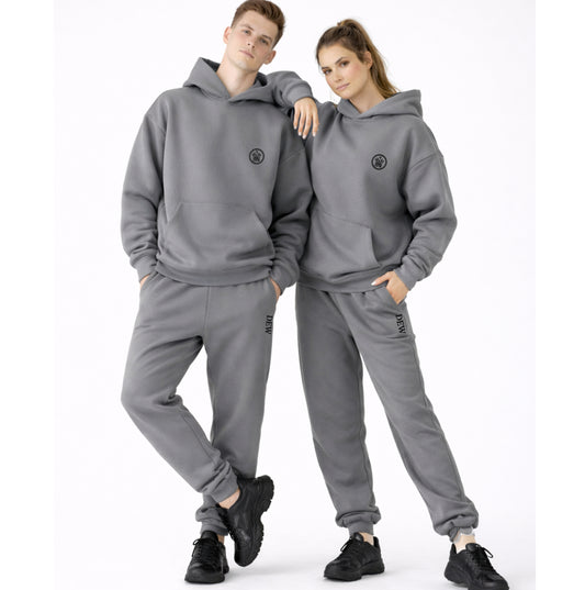 models wearing grey dew oversized unisex hoodies joggers set
