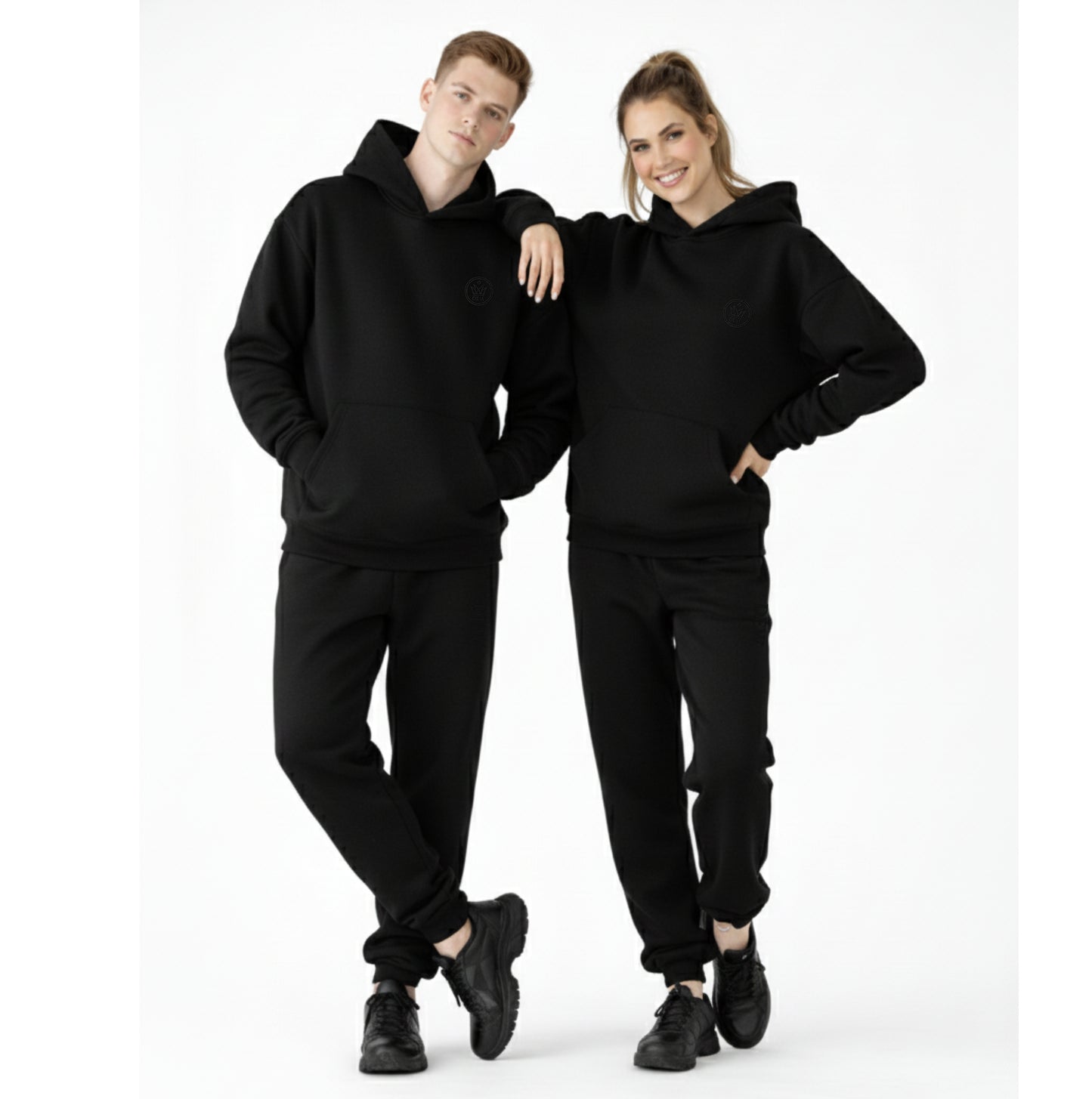 models wearing dew unisex oversized hoodies and joggers