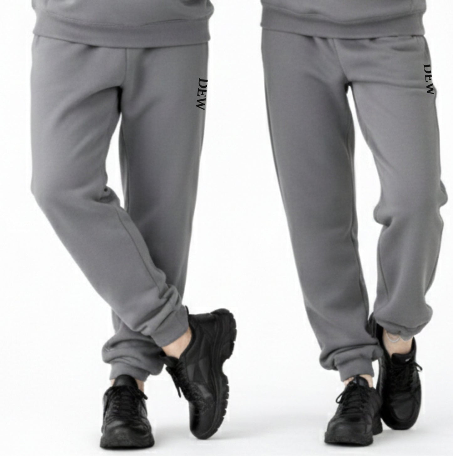 Gray sweatpants with brand logo worn by a person on a white background