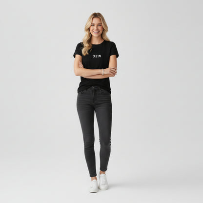 Woman wearing Dew black tee in a white background full front image
