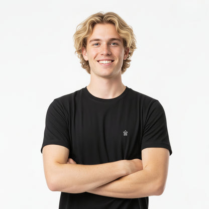 Person wearing a DEW 100% Cotton black t-shirt with a small embroidered Dew logo on a white background