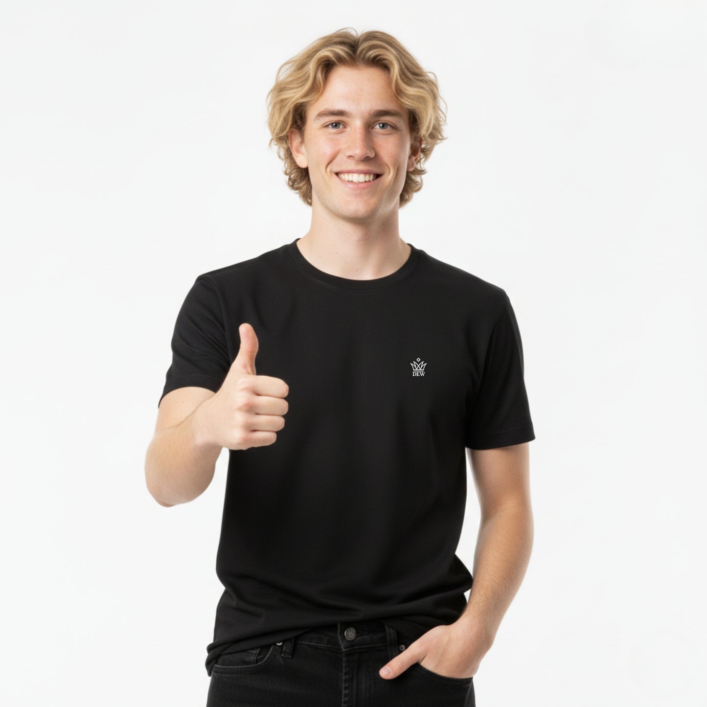 Person wearing a DEW 100% Cotton black t-shirt with a small embroidered Dew logo, giving a thumbs-up gesture on a white background