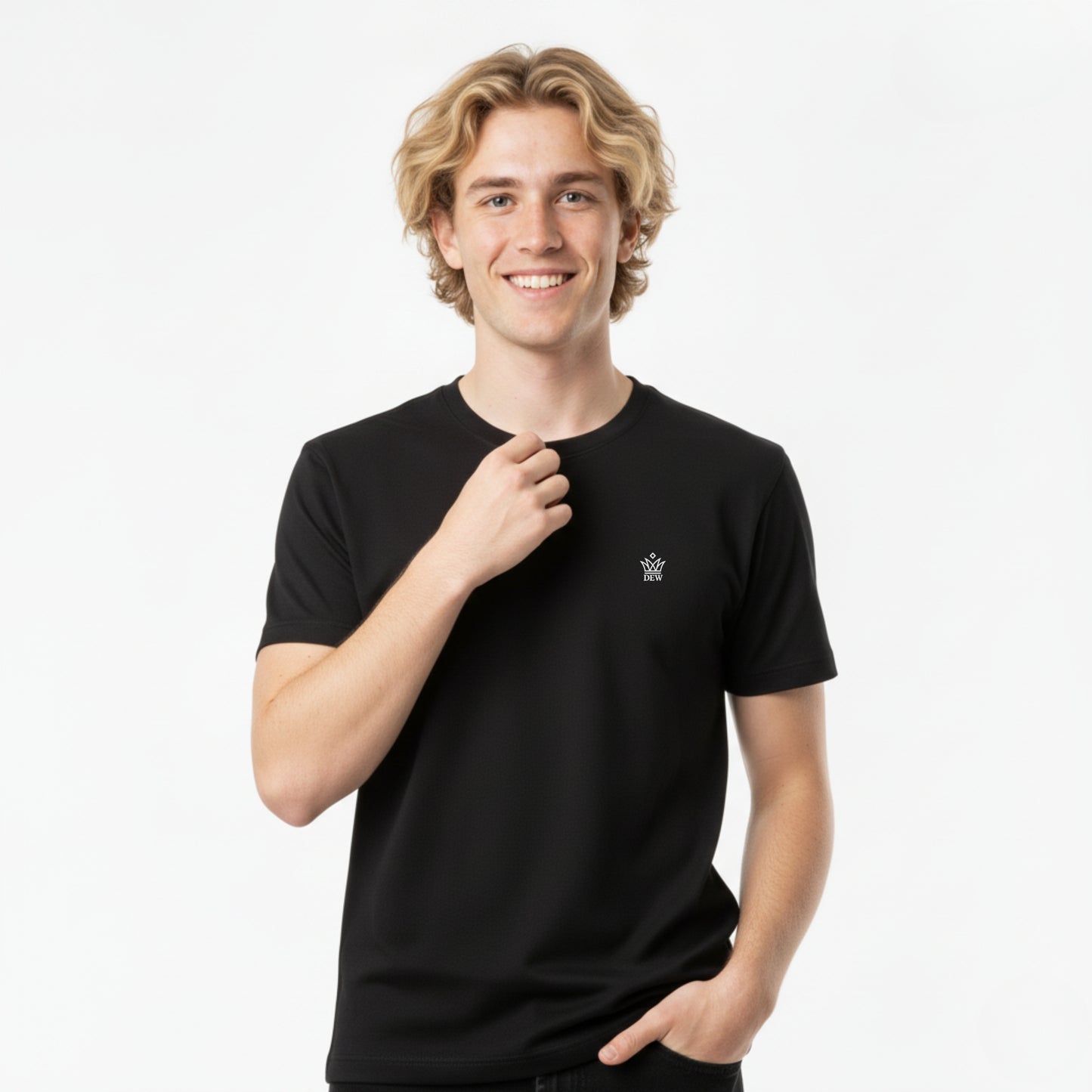 Person wearing a DEW 100% Cotton black t-shirt with a small embroidered Dew logo on a white background