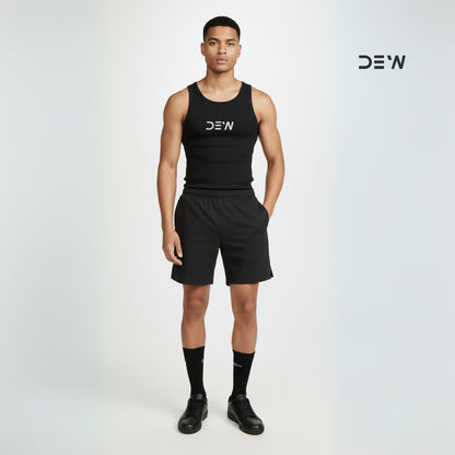 Person wearing a black tank top and shorts and Dew Crew socks
 with 'DEW' branding on a white background
