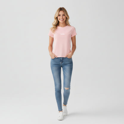 Woman wearing petal pink Dew tshirt in plain backgound