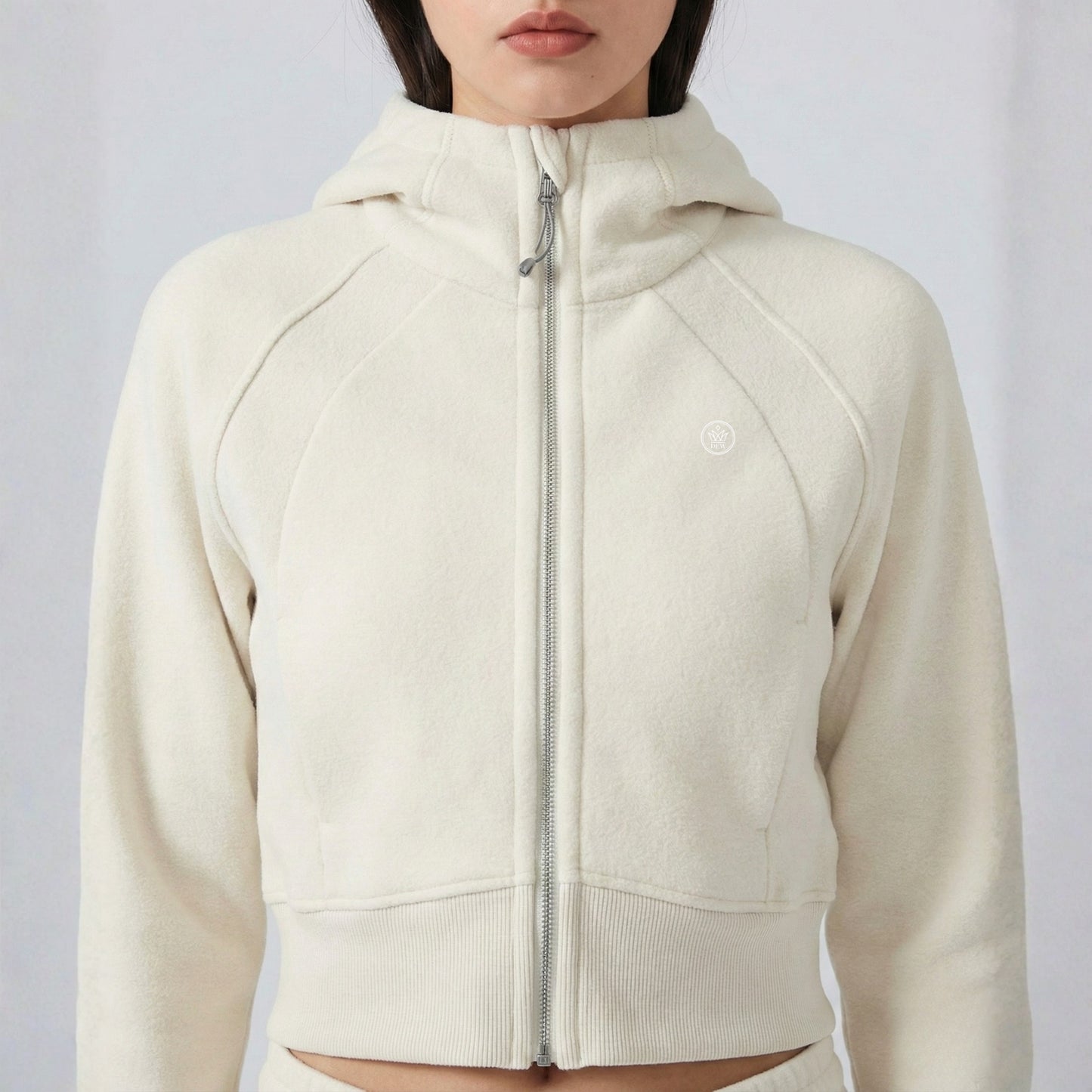 women wearing Dew Women's Premium Crop Zip Jacket in off white cream colour