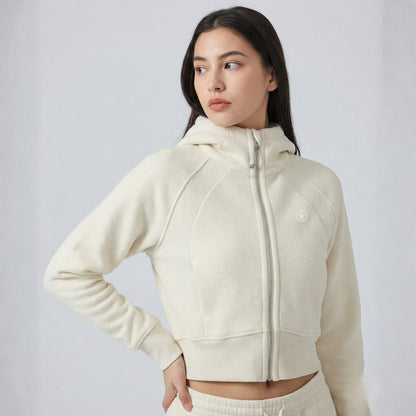women wearing cream Dew Women's Premium Crop Zip Jacket