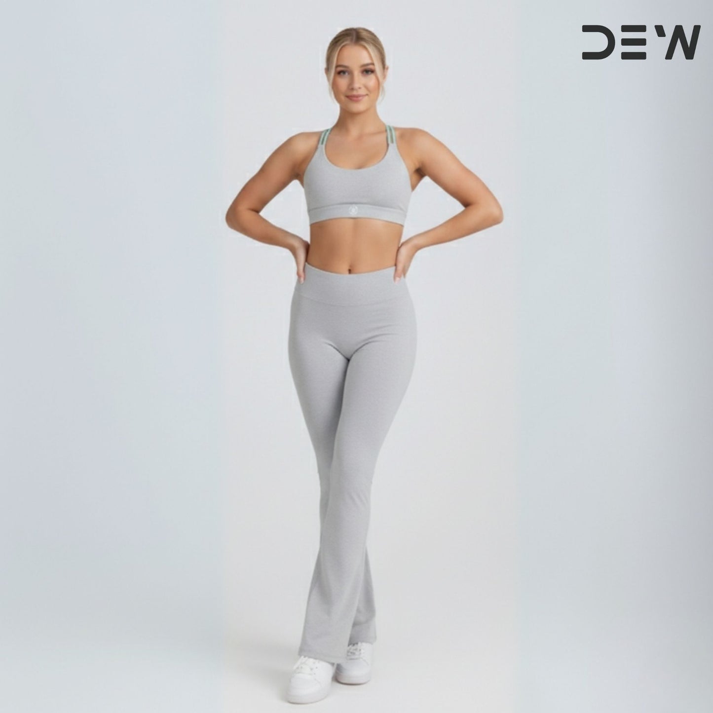 Australian woman wearing Grey Flow Fit Flare seamless leggings with high-waist fit.