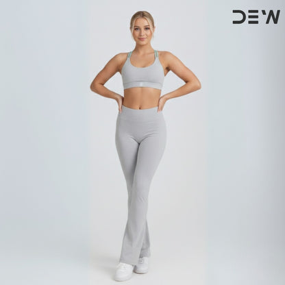 Australian woman wearing Grey Flow Fit Flare seamless leggings with high-waist fit.