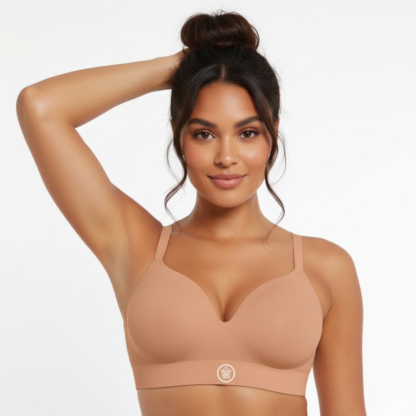 Woman wearing a dew coco bra against a plain background
