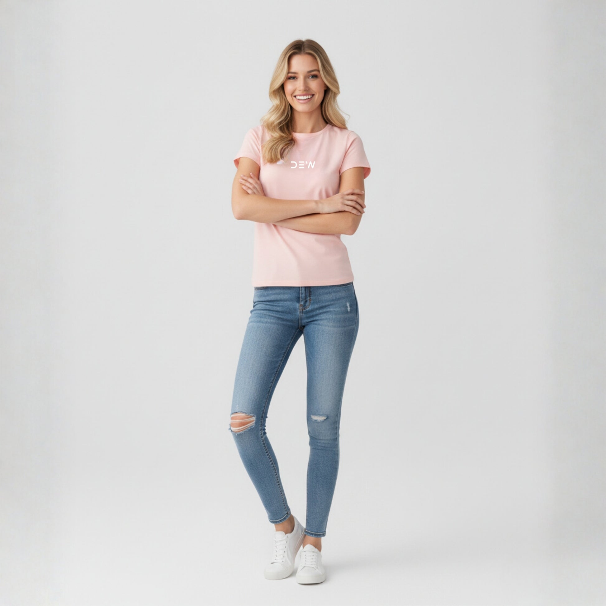 Woman wearing Dew petal pink tee in a white background