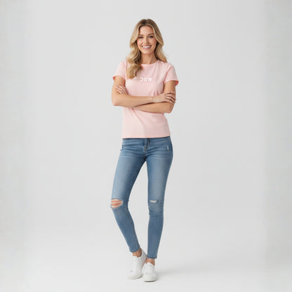 Woman wearing Dew petal pink tee in a white background